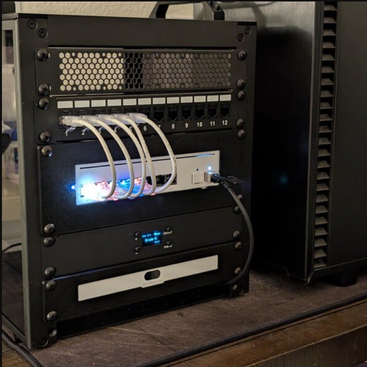 10 inch rack with Calculated MFG patch panel, switch mount and Raspberry Pi mounts